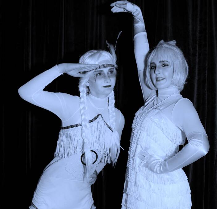 Creepy and kooky: Aria Little and Jessica Newell in costume as two ghostly Addams Family Ancestors at a dress rehearsal for Spectrum Theatre Group's upcoming musical production. 