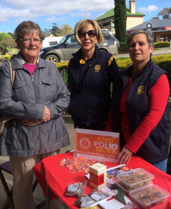Making a difference: Marie Walter with Pambula Rotarians Carol Cloke and Sue Burka who are ran a street stall for End Polio Now on Monday, October 24.