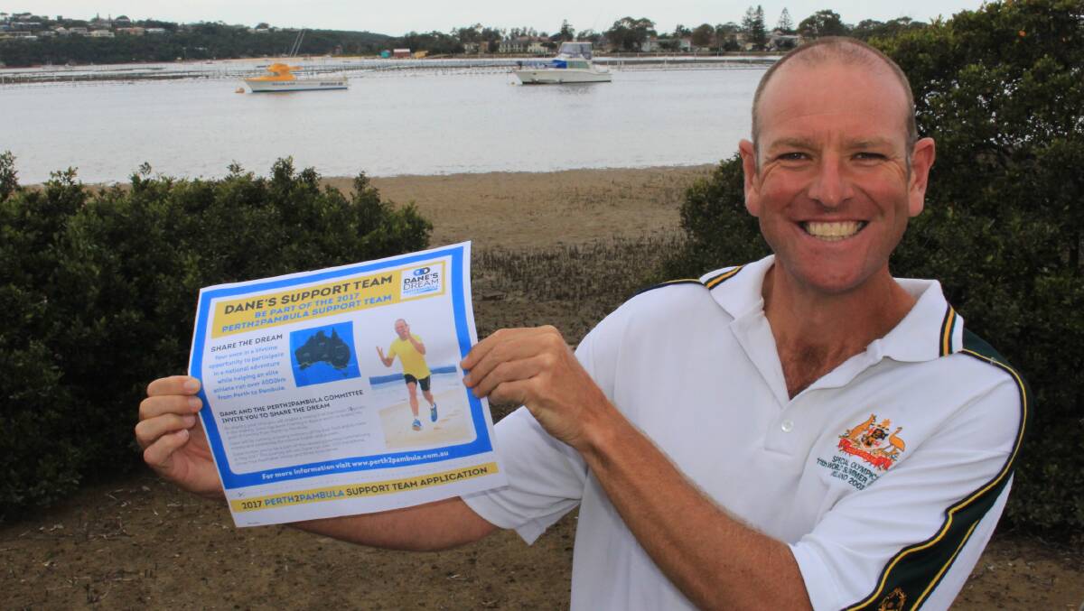Dream come true: Dane Waites holds up a flyer encouraging people to join his support team for Perth to Pambula which will commence in June. Picture: Melanie Leach