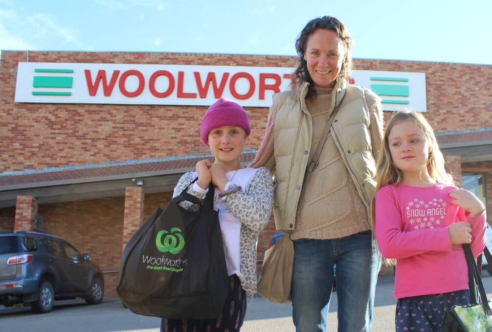About time: Nikki Whitehead of Nethercote and her girls Matilda, 8, and Charley, 6, said they already avoid using plastic bags and were glad to hear that single use bags will no longer be available at the local Woolworths. Picture: Melanie Leach