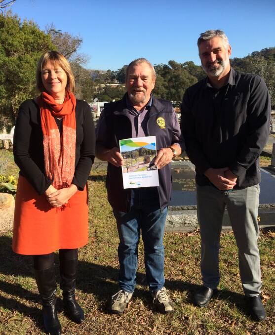 Bega Valley Shire Council's Anne Cleverley and Simon Schweitzer with, Pambula Rotary's Peter Moore with the new Pambula cemetery agreement.