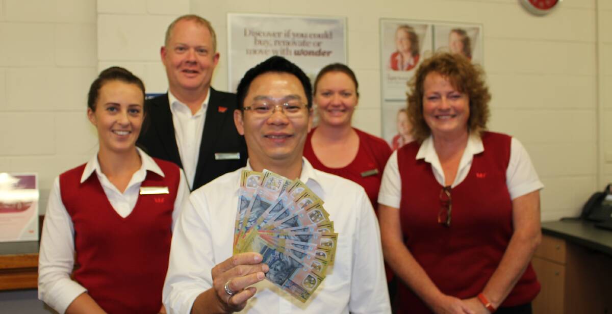 David Lindsay, Laura Golding, Kylie Lindsay, Renee Spiteri and Minh Nguyen, with the cash that is available for a local charity or not-for-profit organisation.