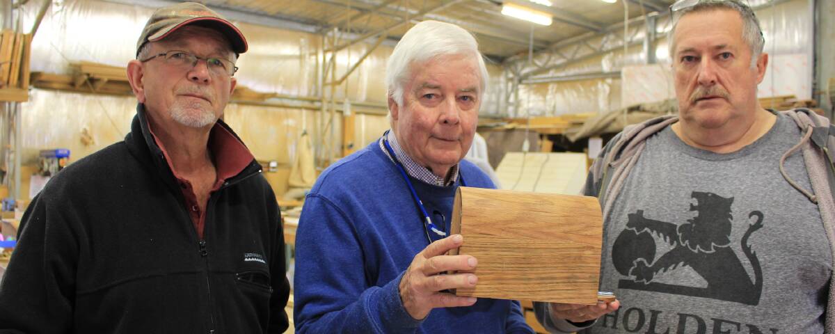 Men's Shed support: Wanderer Replica Project's Jon Gaul holding the donation box made by Jack Gray, right, and to be decorated by Louis Labourmène. 