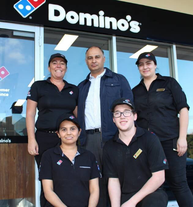 Dharma Adhirkari (centre) is excited to open Domino's Tura Beach on Wednesday. 