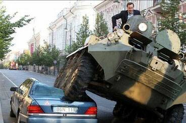 Mayor crushes car with tank
