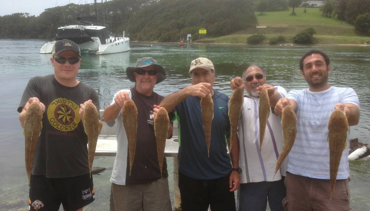 FLATHEAD OPTION: Wazza and Simon of Lighthouse Charters Narooma’s plan B. A cracking box of flaties…never fails to a smile on the fisho’s faces. (24/12/2013) 