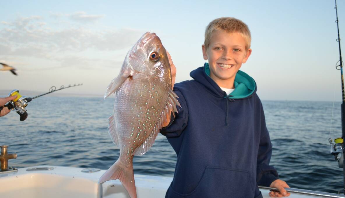FIRST SNAPPER: Young Benjamin on his very first fishing trip showed everyone how it was done with a catch of snapper, mowies, kingfish and flathead while on Lighthouse Charters, well done Ben! (5/2/14) 