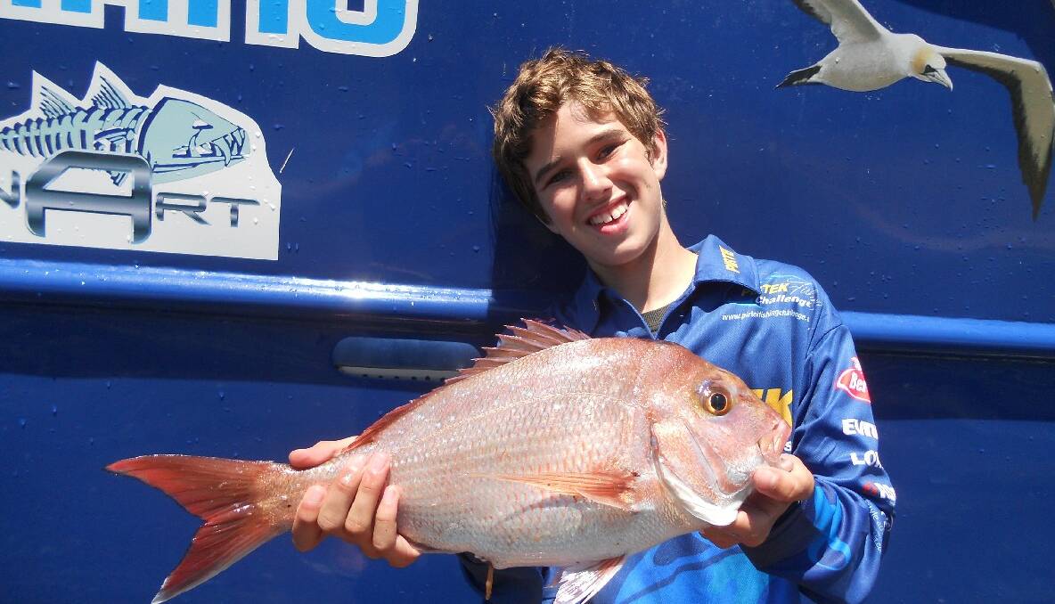 PB SNAPPER: Isaak Miller of Tahmoor with a personal best snapper caught with Narooma Fishing Charters on the weekend. 15/1/2104