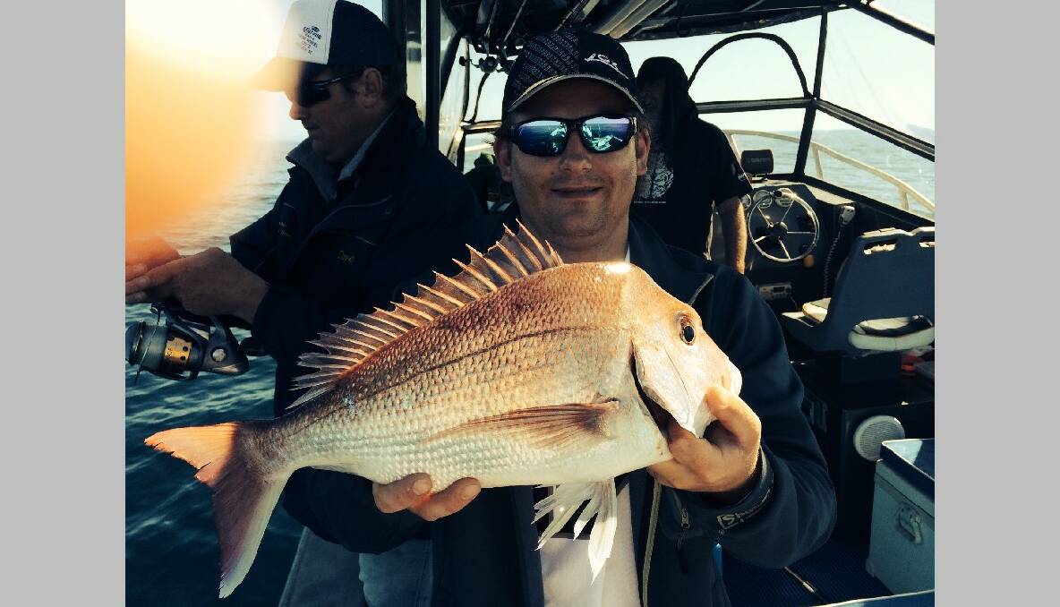CHARTER SNAPPER: Lee Townsend of BCF Fyshwick with a snapper caught on board Narooma Fishing Charters. (16/10/2013) 