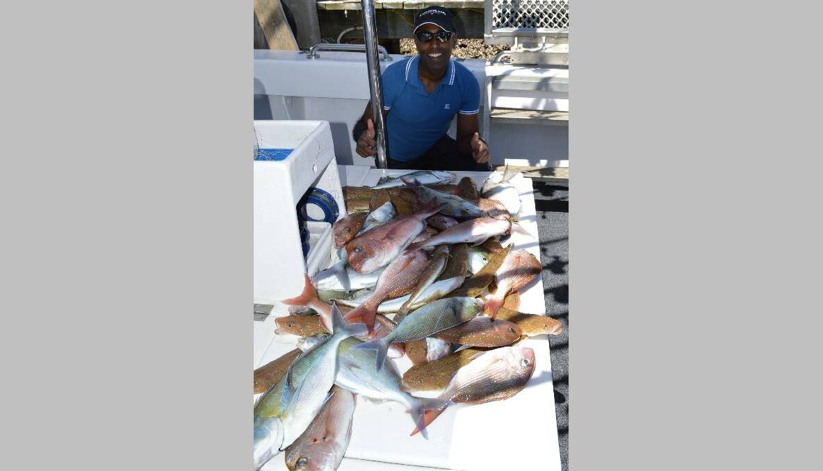 Lalit Prasad proudly displays the Australia Day Catch! A great mornings fishing with Wazza & Simon of Lighthouse Charters Narooma. Looks like fish for dinner! 29/1/14