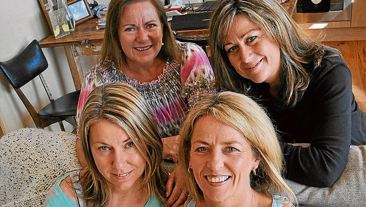 • Tina Stahmer, sitting left, with her closest friends (clockwise from back left) Leesa Stewart, Nicky Bamford and Michelle Collins. The group is hoping to raise money for an operation to save Tina’s life. 
