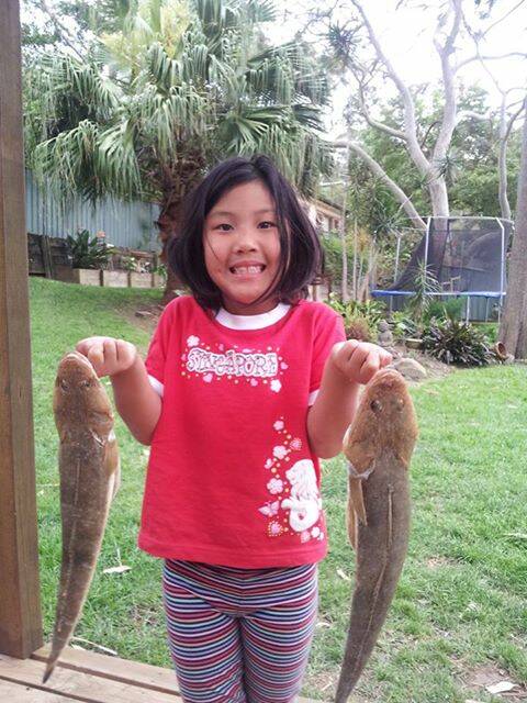 BIG SMILE: Hai Yan with her great catch!