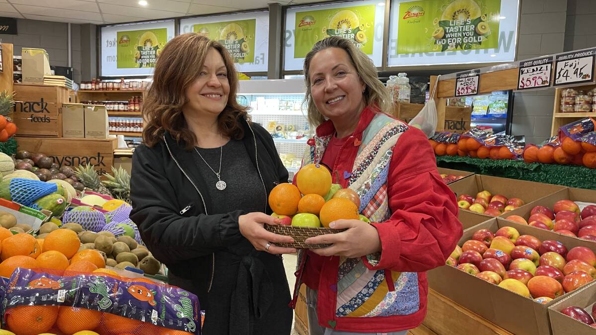 Pambula Fruit Market owner Tetyana Demetriou with her friend Irina Diadyk. Photo: Amandine Ahrens.