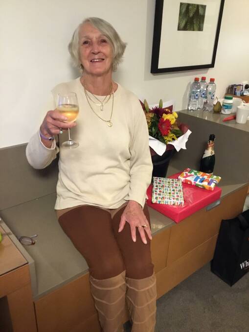 CHEERS: Lady Mary Burke celebrates her 79th birthday during hotel quarantine in New Zealand in her travels back home. 
