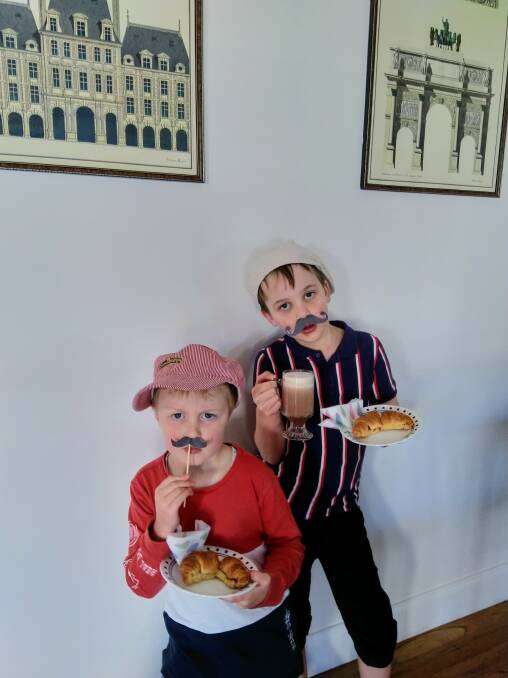 Judd and Finn Mackey enjoying their French breakfasts for SCAC's French day, 2021. Photo supplied.