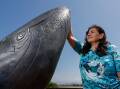 Dr Jodi Edwards with the Burri Burri whale artwork she co-designed at Reddall Reserve. Picture by Anna Warr