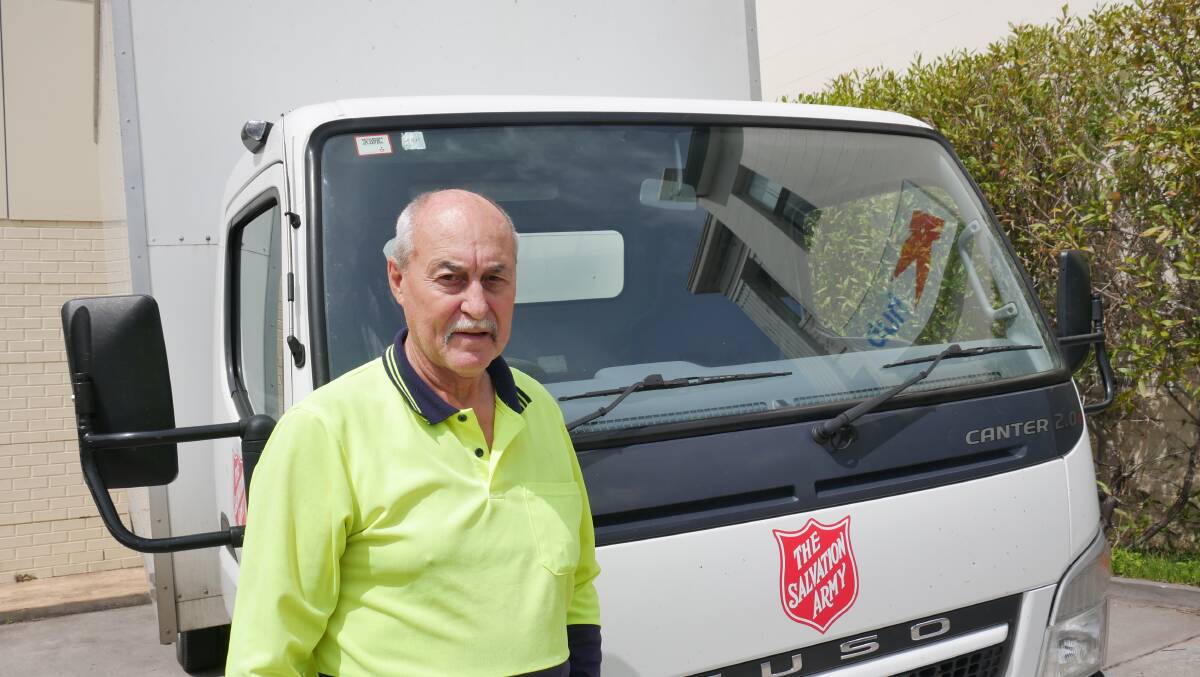 Bega Valley Salvation Army truck driver Mervyn Baxter with his vehicle outside the Salvos store in Bega. Picture by Ellouise Bailey 