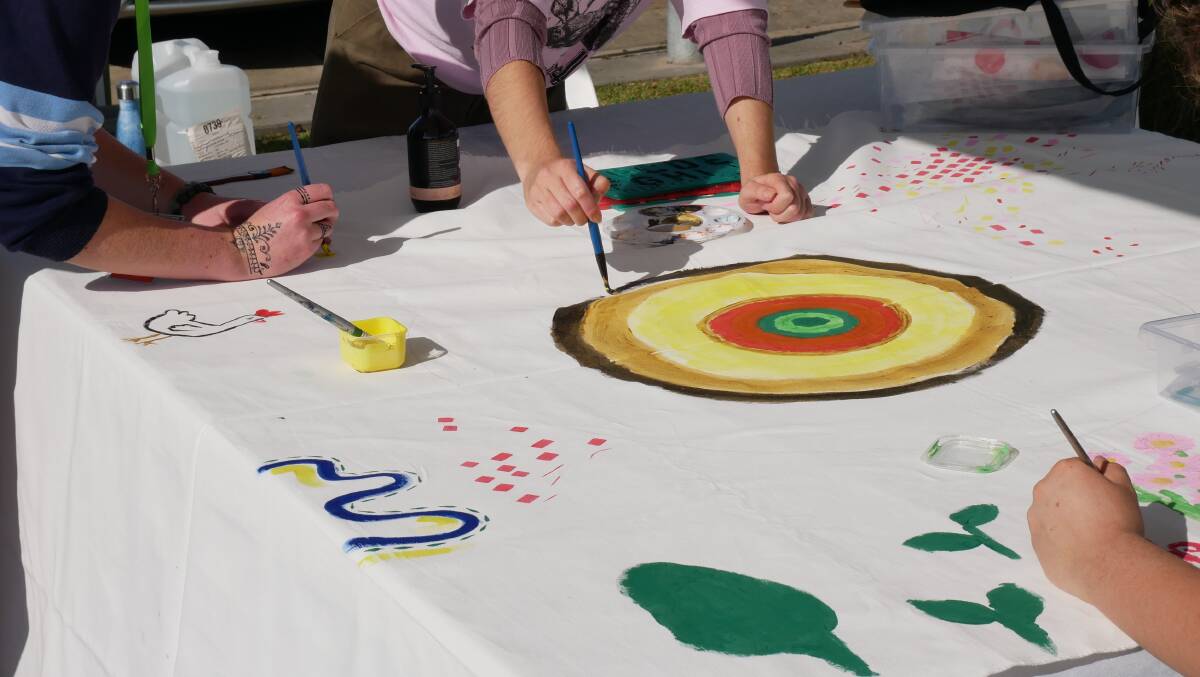 The day was full of fun activities such as painting, henna tattoos, pizza for lunch, and music. Photo: Ellouise Bailey