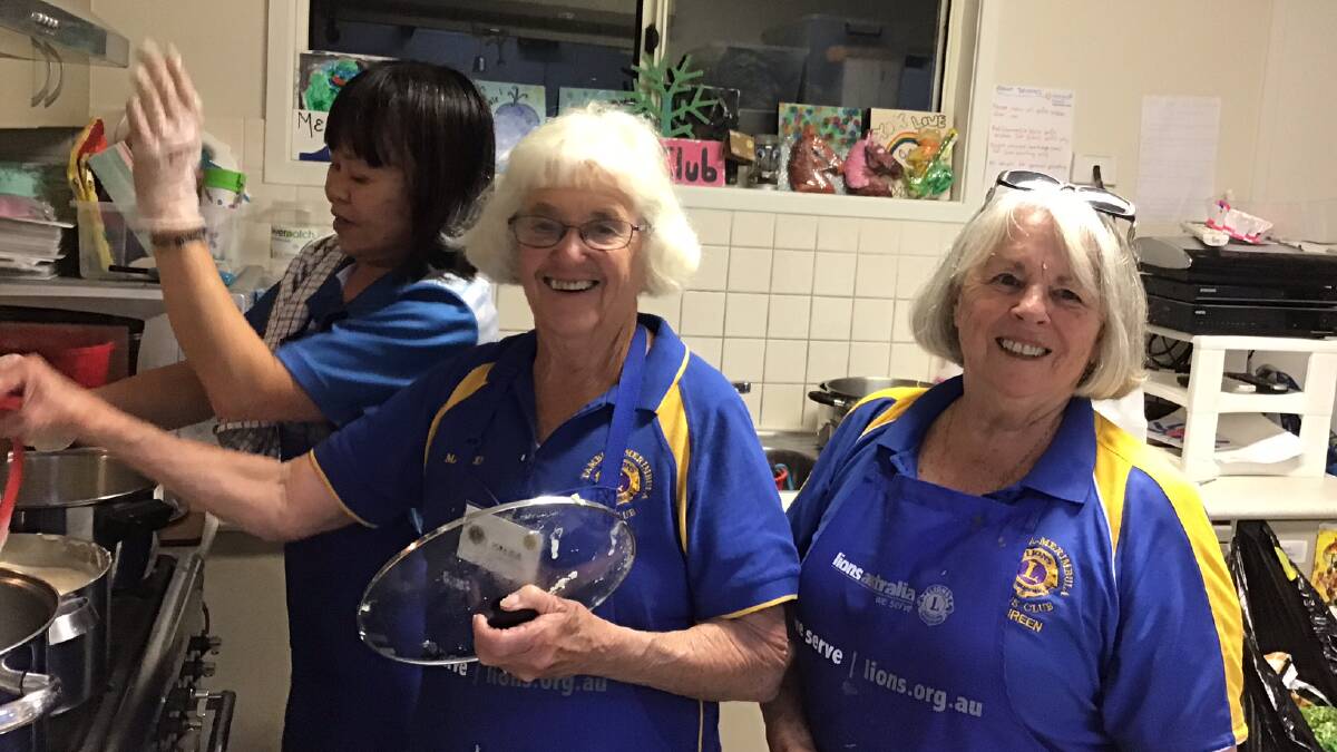 From left: Dara, Valda and Maureen from the Lions Club of Pambula Merimbula preparing dinner for the Rolling Solo event on Saturday May 2. Pictures: supplied. 
