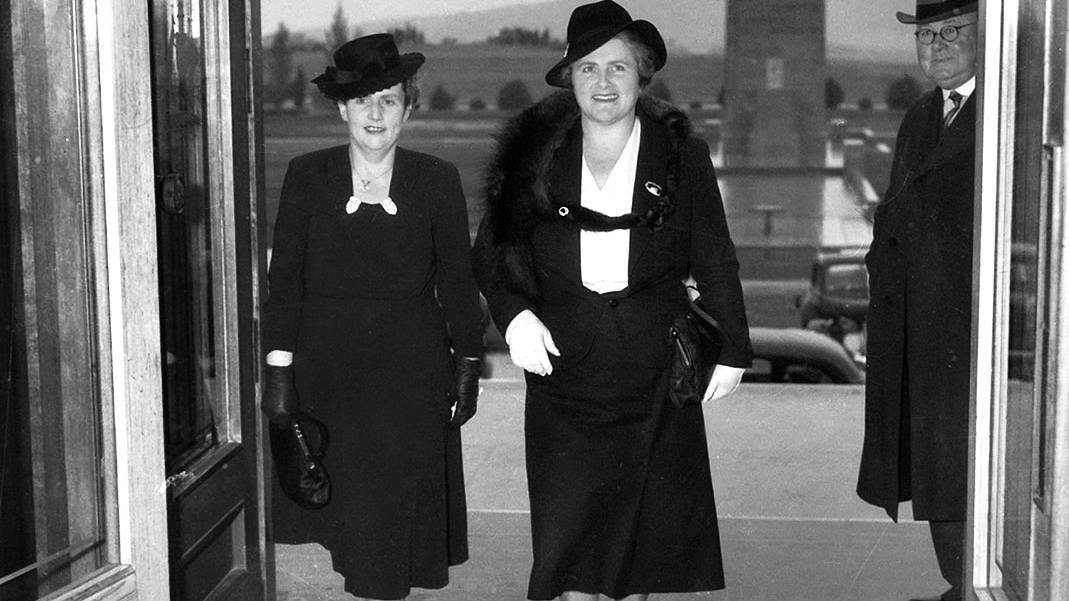 Dame Dorothy Tangney and Dame Enid Lyons entering the front door of the House of Representatives on September 24, 1943. Picture: Australian War Memorial
