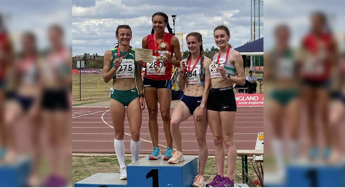 Broulee's Jaylah Hancock-Cameron on the podium in Bedford. Picture: @limitless_track_team