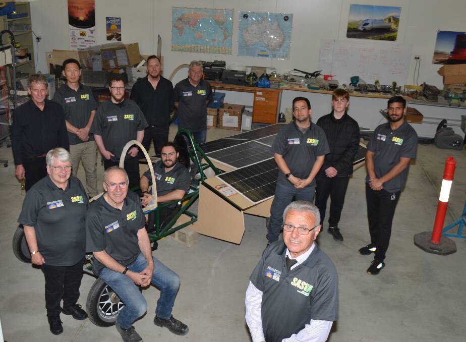 Pat Bosco (front) with fellow team members of the South Australian Solar Vehicle Association and Sun Sprite - their entry to the Bridgestone World Solar Challenge 2023. Picture by Anthony Caggiano