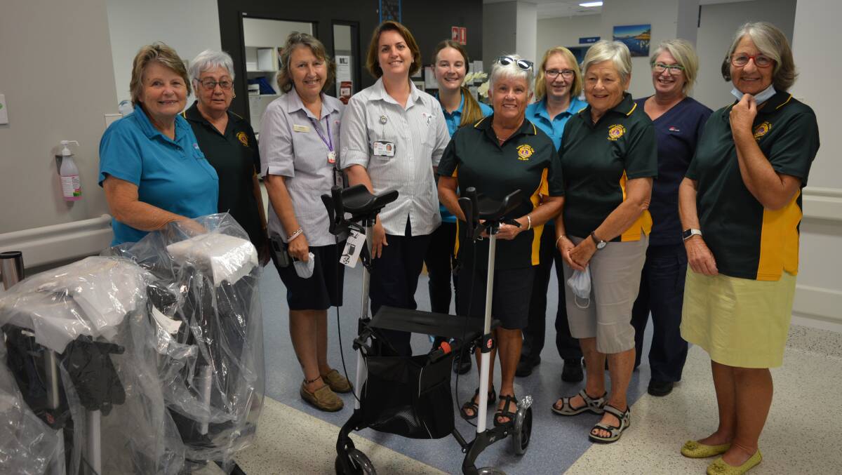 Tathra Lions Club members donate four new walkers to the SERH sub acute rehabilitation unit. Picture by Ben Smyth