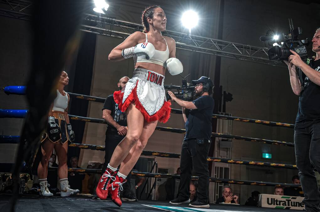 Jaala Tomat within the boxing ring, enters her bouts to the song 'Send Me On My Way' by Rusted Root. Picture supplied