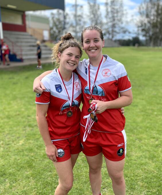 Narooma Devils player Calissa Badullovich celebrates with captain-coach Jamie-Anne Wright. Picture by James Parker