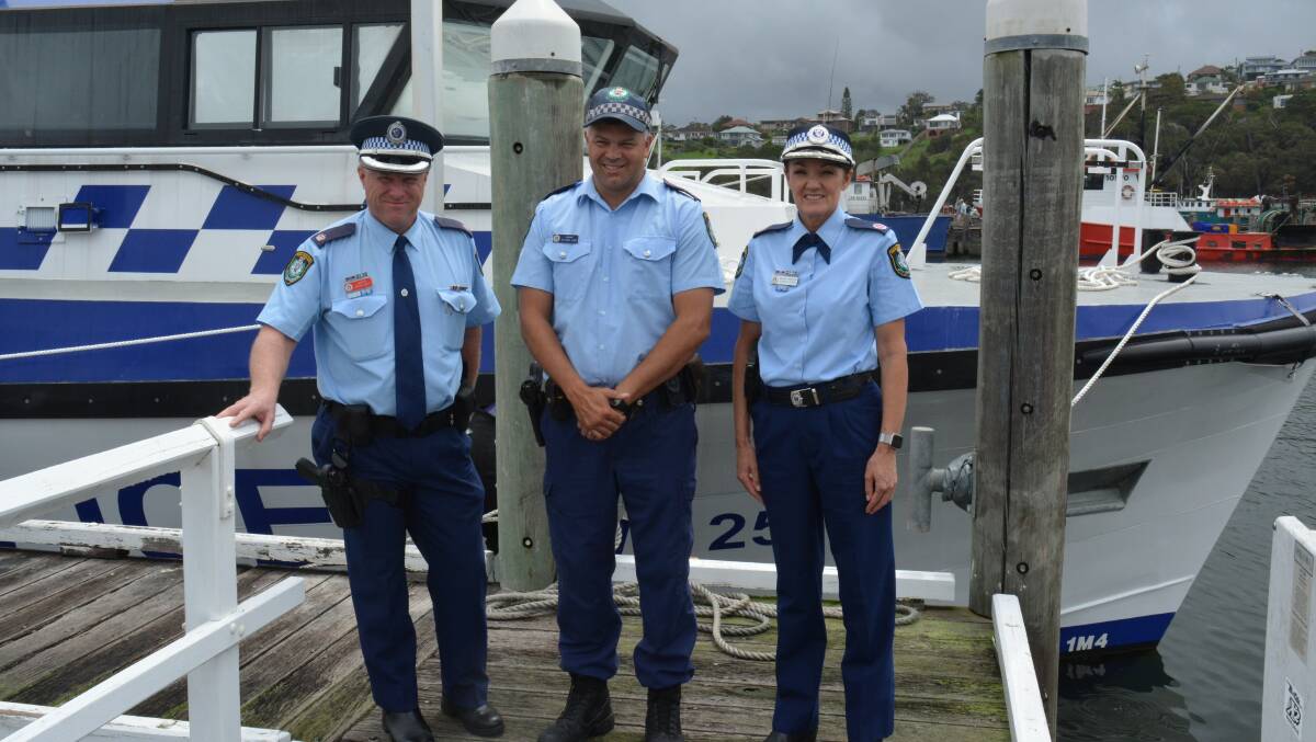 NSW Police Southern Region Chief Inspector Peter Volf, Marine Area Command Sergeant Steven Judd and Assistant Commissioner Karen Webb launch Eden's new police vessel on Thursday. Photo: Ben Smyth