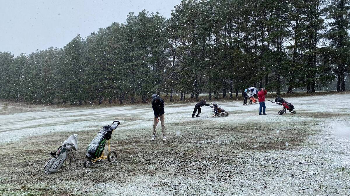 Temperatures at Bombala plummeted around lunch time Saturday, catching a group of golfers short of the "green". Photo: James Tatham