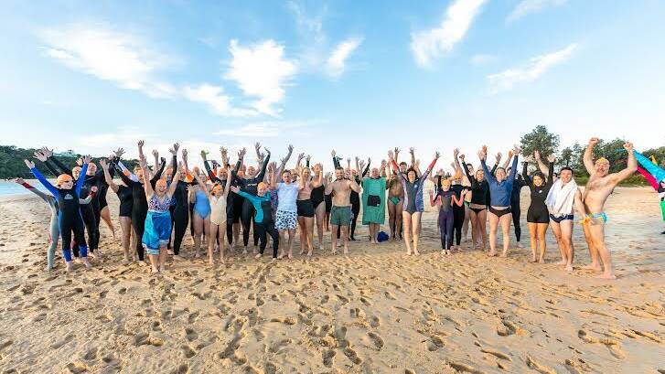 WinterSun Festival swimmers after their early morning dip at Merimbula. Photo: Toni Ward, DoubleTake Photographics