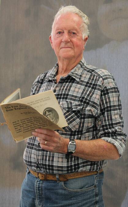John Cooper of Angledale with his treasured book chronicling the first flight by an Australian from England to Australia. Photo: Ben Smyth