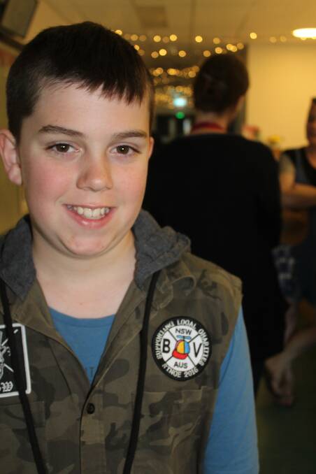 Ben Trowbridge, 11, and the patch the Bega Valley Bearded Villains created and sold to raise funds for the SERH children's ward.