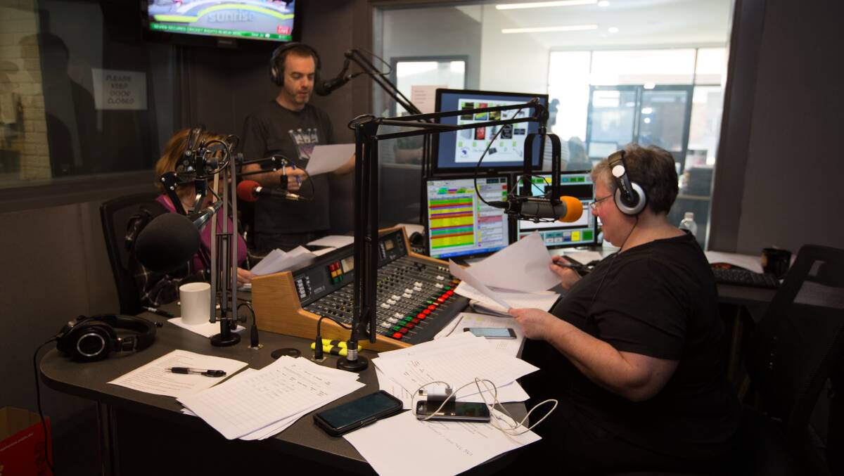 The East Coast Radio team at work in their studio during the weekend's radiothon.