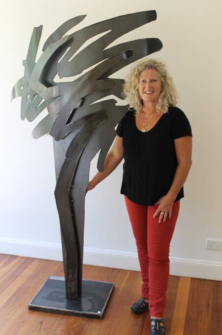 NEW EXHIBITION: Far South Coast sculptor Jen Mallinson shows off one her impressive large works. She is part of a joint exhibition at Ivy Hill this month with artists Antonia Haege and Olivia Bernardoff.