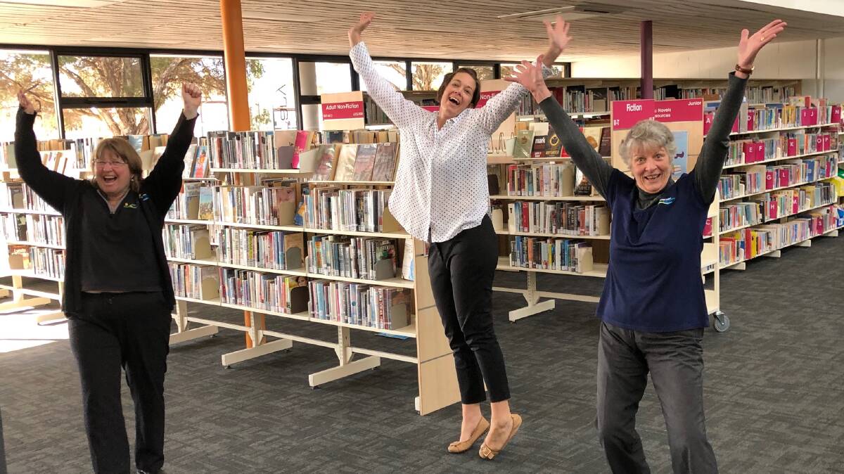 Vicki Buckley, Jayde Timms and Anne Moore from Bega Valley Library Service are jumping for joy as COVID-19 restrictions ease and libraries reopen from June 15.