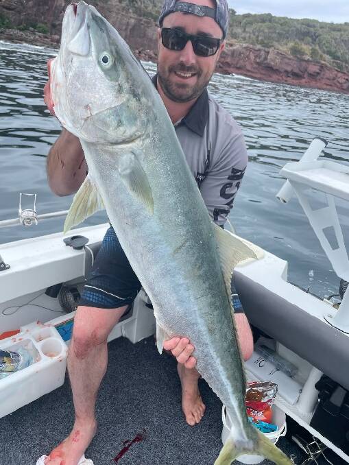 Daniel Cowlishaw with a great kingfish taken trolling a hard lure from the boat of Alex Barker off Yellow Rock beside Long Point.