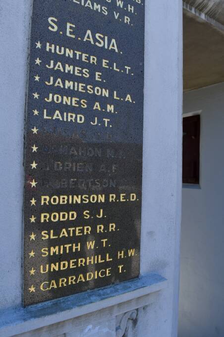 Re-gilding of servicemen's names on the Bega Soldiers' Memorial is underway. Picture by Ben Smyth