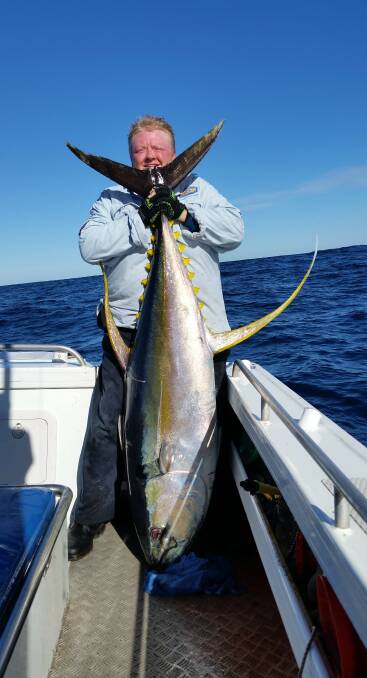 CATCH OF THE DAY: Heather Sutterby of Tura Beach shows her lovely yellowfin tuna taken off Merimbula.