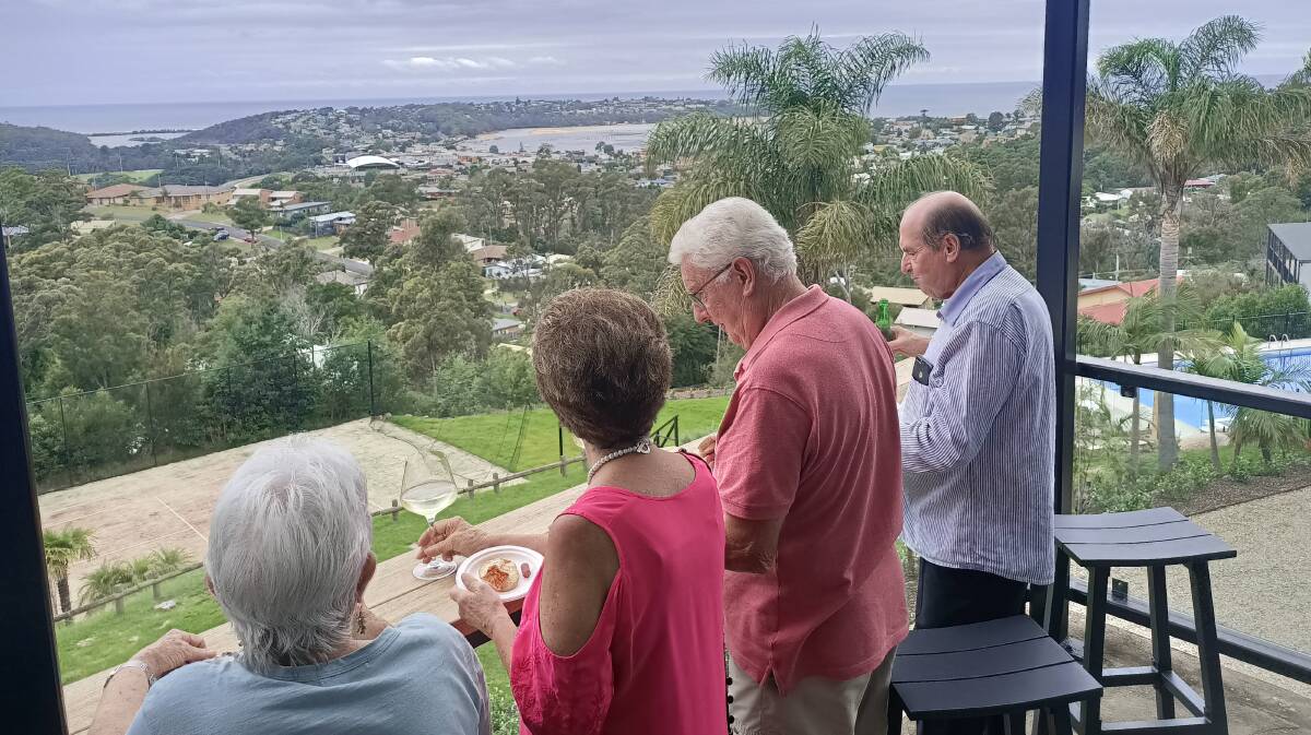 Enjoying finger food and refreshments - and the view - at Hillcrest's "mingle" on Monday. Photo: Ben Smyth