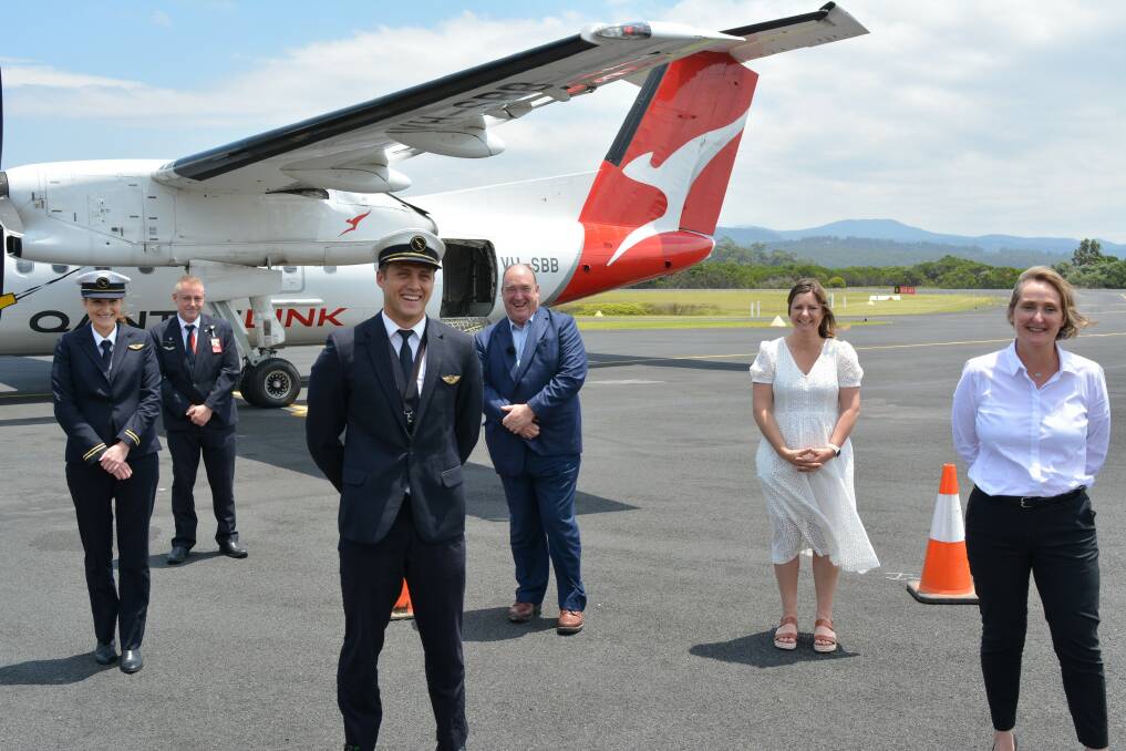 The first Qantas flight into Merimbula arrives on Friday, December 18, with Qantas CFO Vanessa Hudson on board (far right) and welcomed by Mayor Russell Fitzpatrick and Member for Eden-Monaro Kristy McBain. Photo: Ben Smyth
