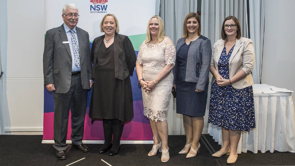 Batemans Bay teacher Jeni McCarthy (second from left) and Wendy Mockler-Giles from Lumen Christi (middle) receive prestigious awards from Education Minister Sarah Mitchell (far right)