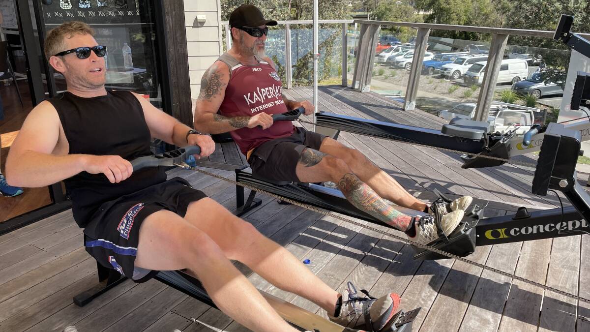 Liam O'Neill and David Barros take Pambula SLSC towards the 24-hour row finish line during the 2022 event. Picture by Ben Smyth