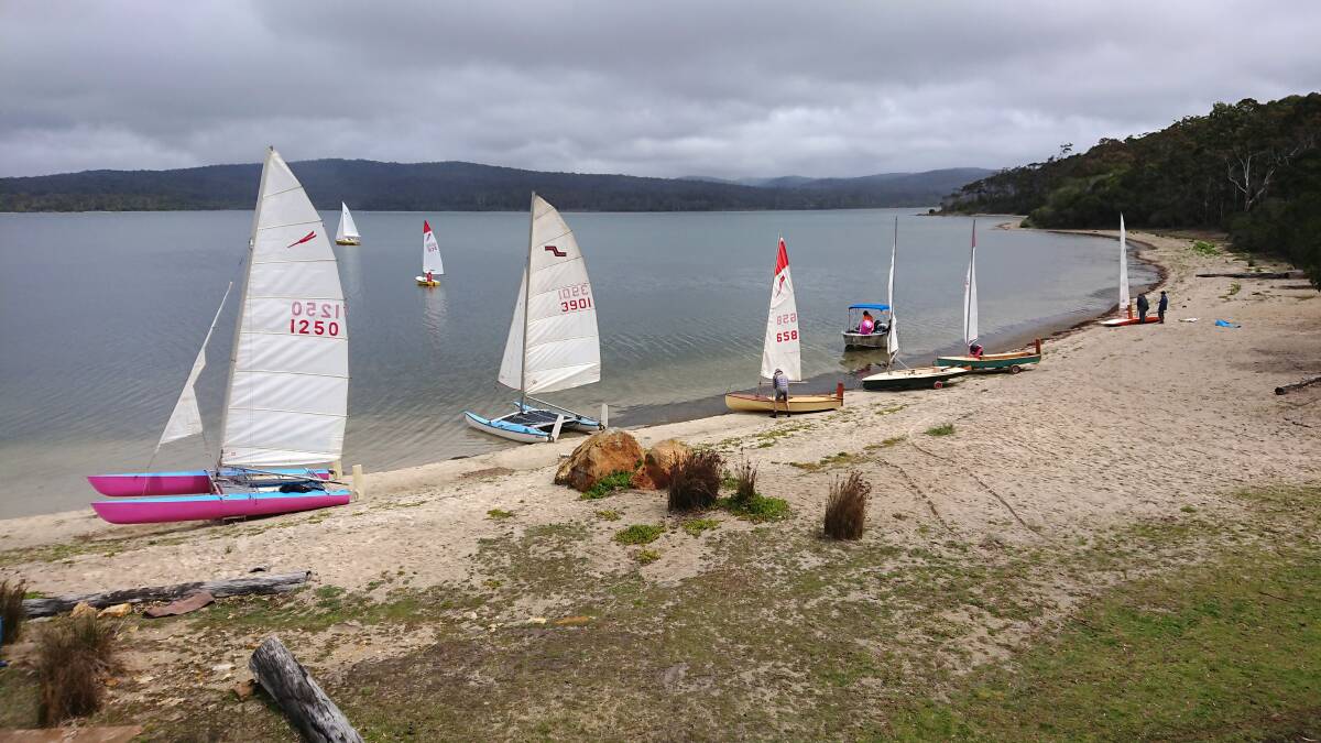 ON THE BEACH: Some of the boats prepare to launch for race one at Wallagoot. 
