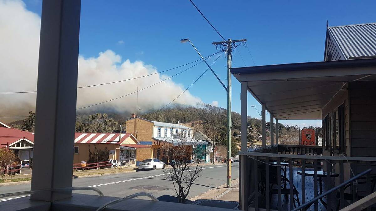 Plumes of smoke from the fast-moving bushfire at Cobargo on Saturday, September 7. Photo: Helen Howie