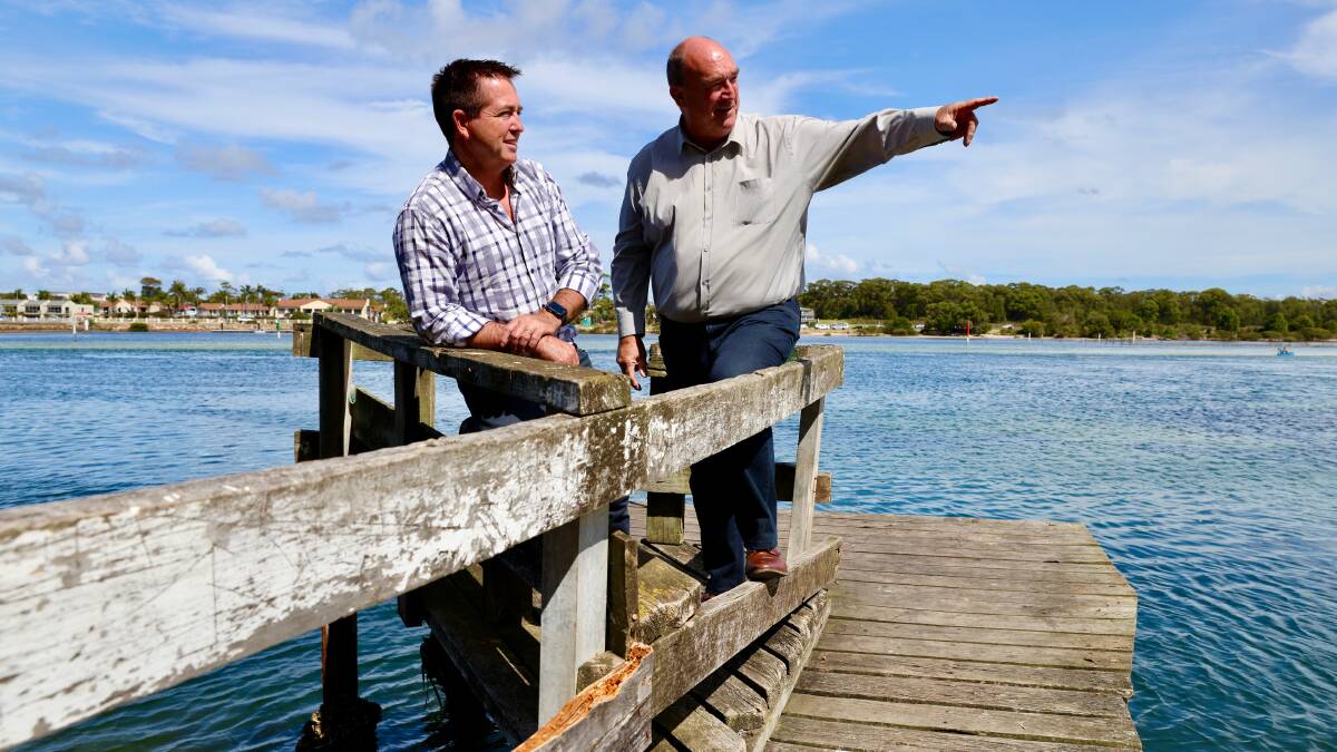 NSW Deputy Premier Paul Toole with Bega candidate and Bega Valley Shire Mayor Russell Fitzpatrick at the Merimbula boardwalk.