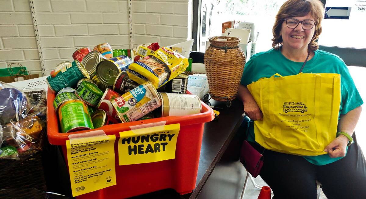 Helping the hungry: Christine Welsh of OzHarvest Sapphire Coast food rescue collects donated goods from local supermarkets as well as running the Sapphire Coast Community Pantry in Bega.
