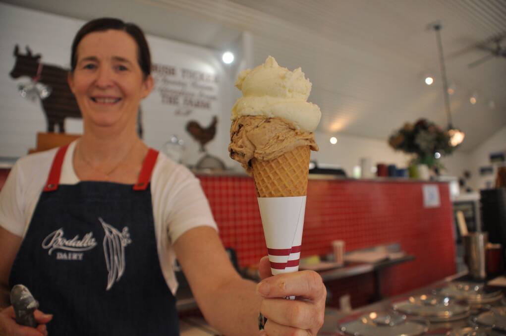 Bodalla Dairy offers 22 flavours of home made ice cream. Cathryn Overton serves up their award-winning Kakadu Plum and Rum ice cream with a scoop of vanilla. 