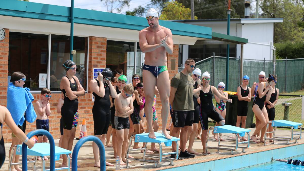 Special visit: James Magnussen goes over some tips for diving off the blocks during a Cobargo swim clinic in November last year.